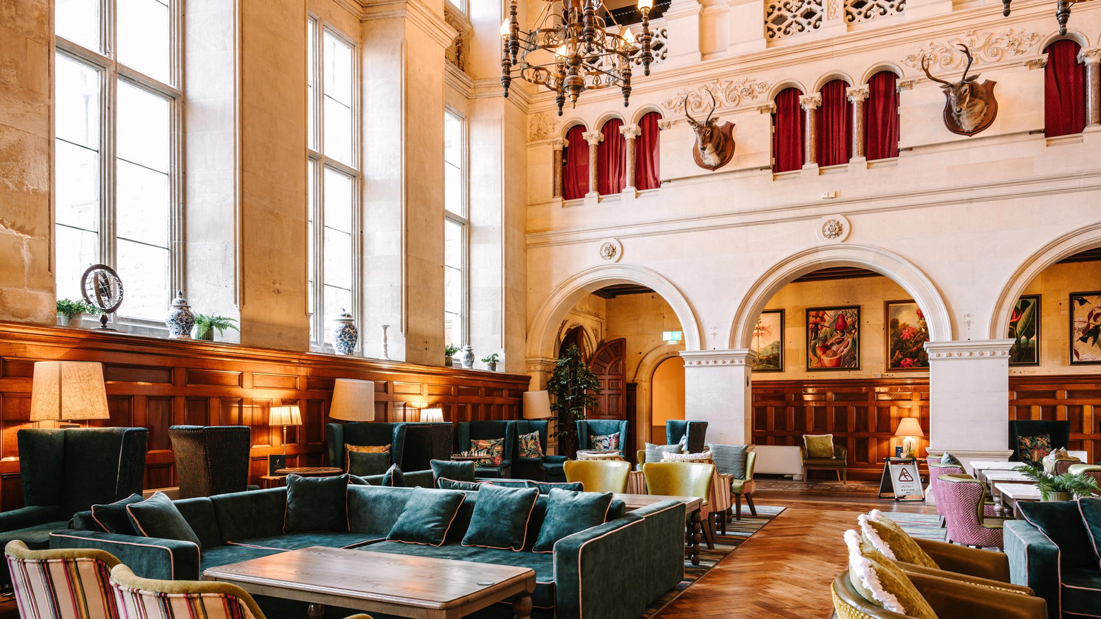 Historic charm meets everyday comfort in the Great Hall, where you can relax, play, and often catch a bit of daytime entertainment.