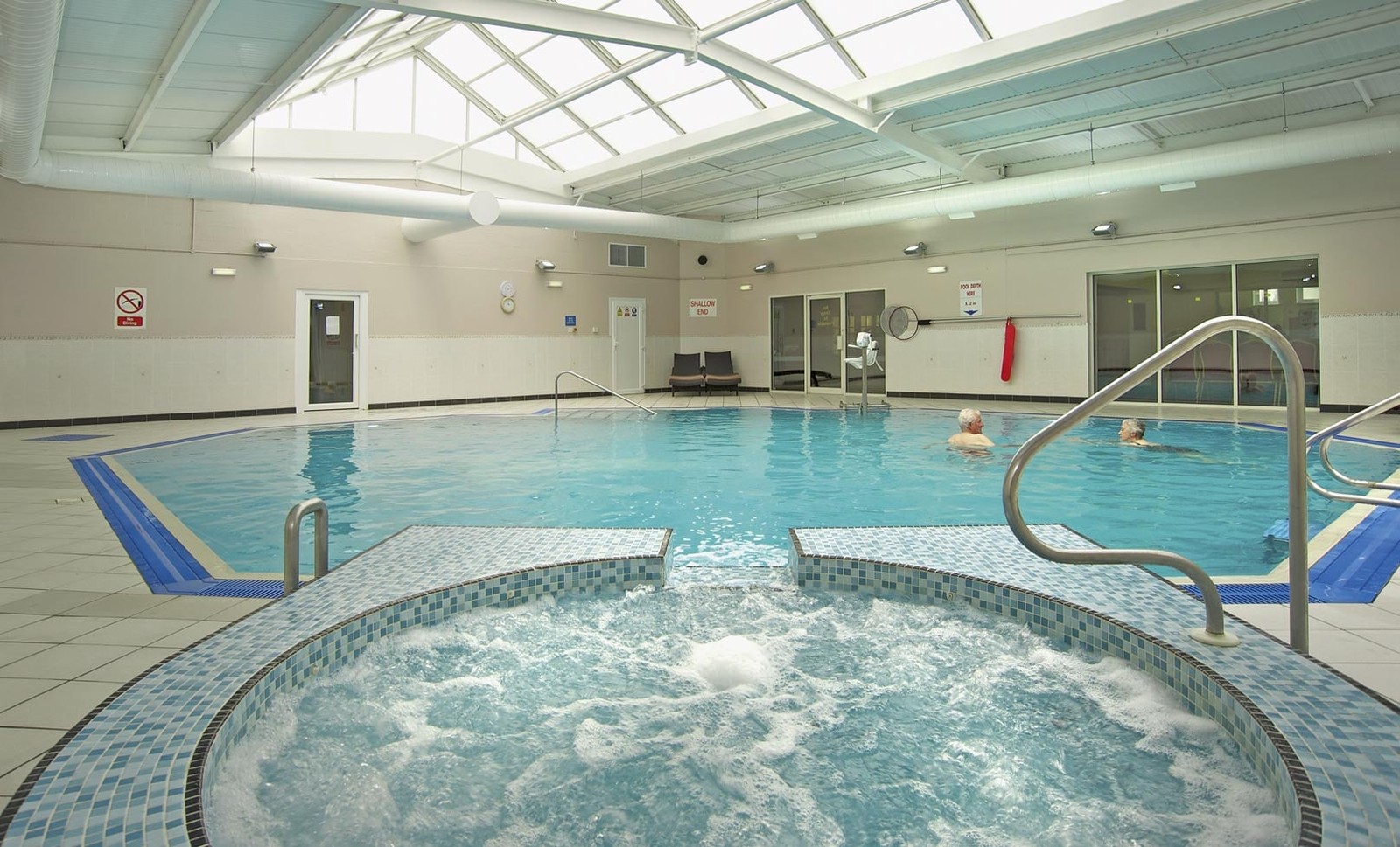 Soak in the soothing bubbles and enjoy a refreshing moment in the pool.