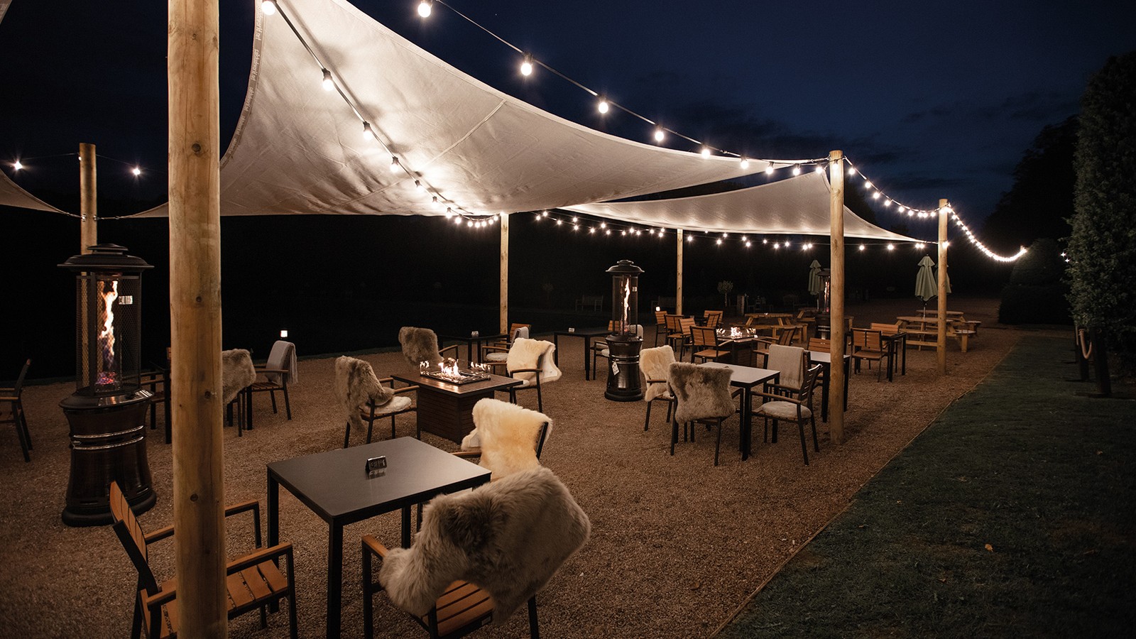 When the evening draws in, gather around the terrace fire pits to stay warm, sip a drink, and soak up good company.