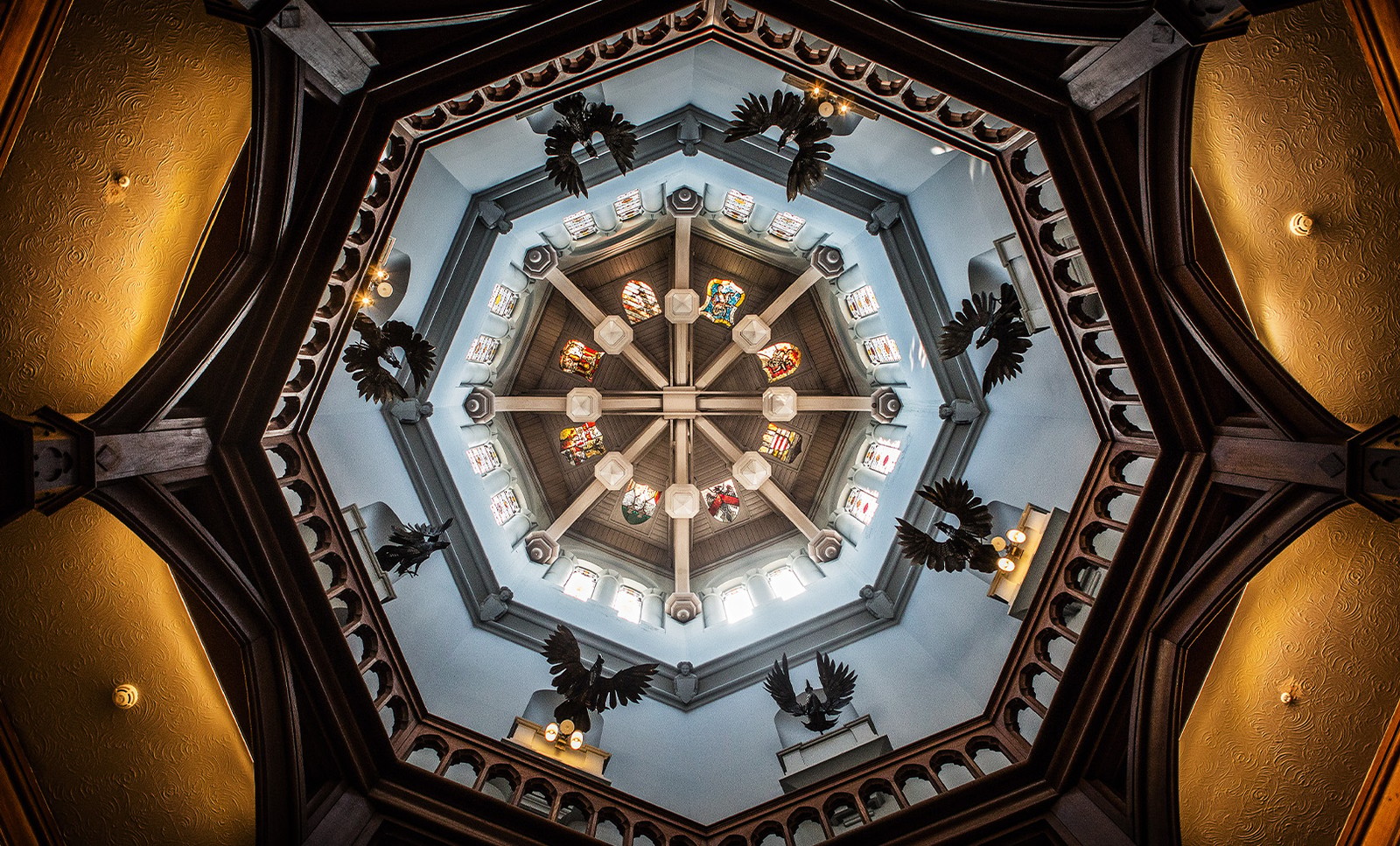 Step into Studley Castle’s main entrance and gaze up at the breathtaking circular ceiling, where intricate stained glass, dramatic statues and perfect symmetry create a truly unforgettable first impression.