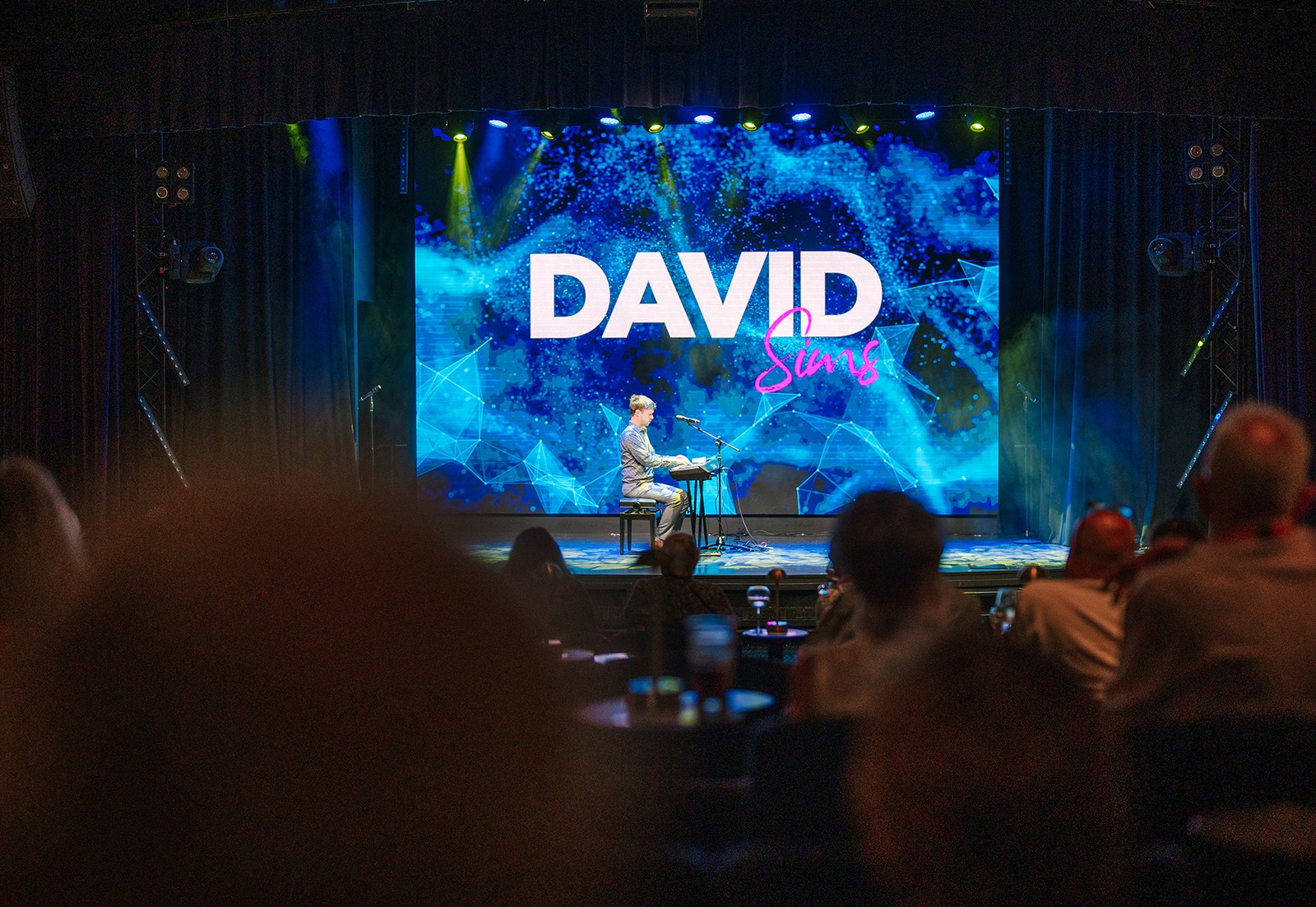 David Sims takes the stage, turning every note into an unforgettable moment.