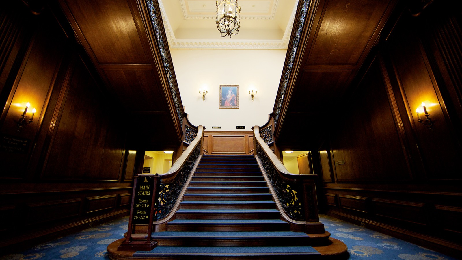This grand Victorian staircase can be found in the manor house.