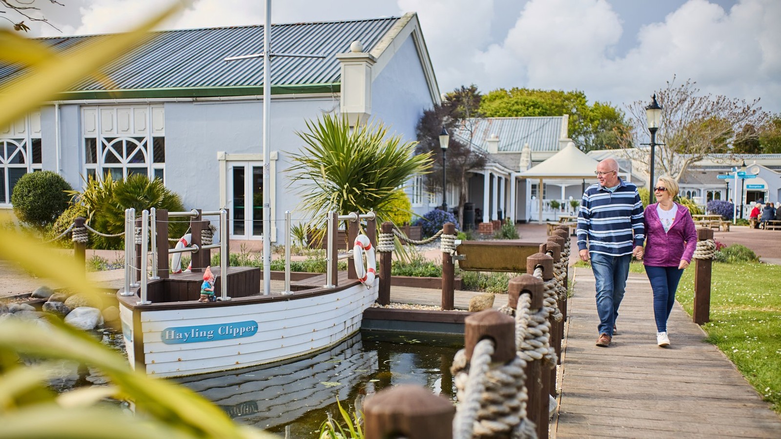 View of the lake and island features with well maintained lawns.