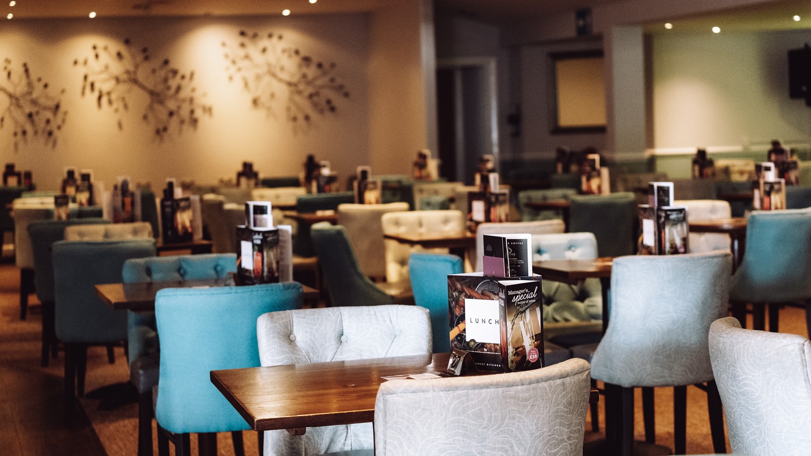 The piano bar with comfortable seating and soft lighting.