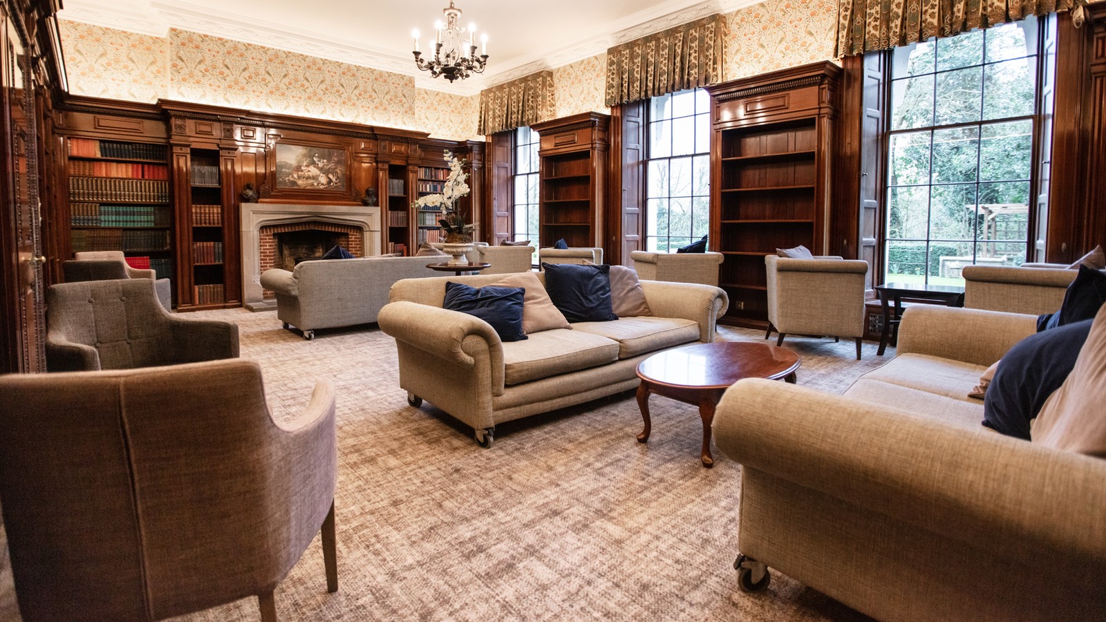 The Library at Nidd Hall with comfortable seating in a warm environment with good lighting.