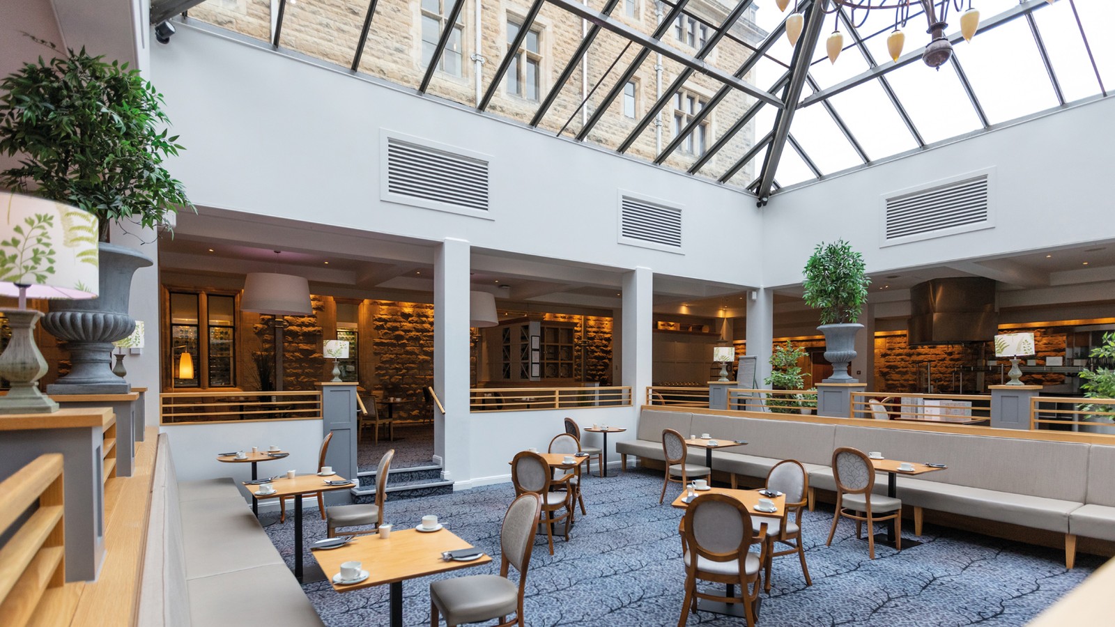 The Sherwood Restaurant is home to the Market Kitchen. Situated within what was previously a courtyard, the original outer walls reflect the buildings historic roots and the glass roof allows natural light to flood in.