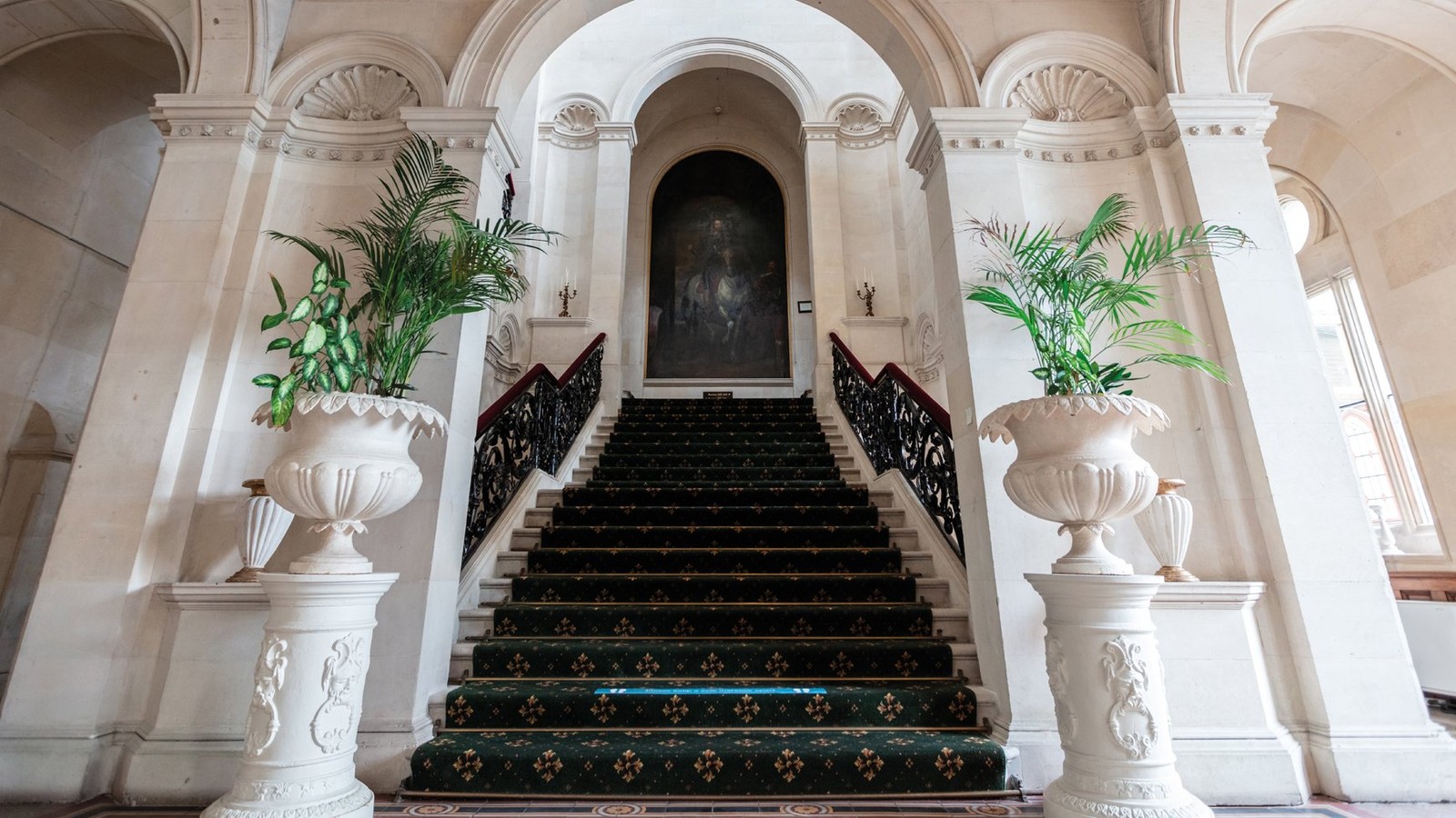 Historic features, such as this grand stairwell in the Great Hall, can be found throughout the manor.