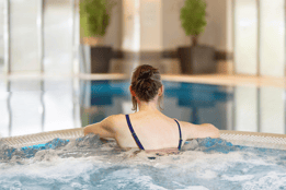 Lady enjoying the pool at The Runnymede on Thames