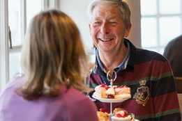 Guests enjoying afternoon tea on the terrace at Bembridge Coast Hotel