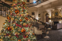 Christmas tree in the grand entrance hall at Cricket St. Thomas