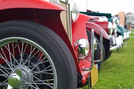 Close up of a wheel on a vintage car