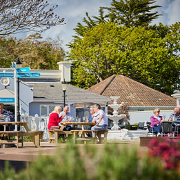 Guests enjoying the courtyard at Lakeside