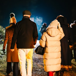 Guests walking on a cold night