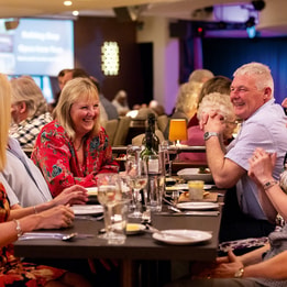 A group of guests dining together