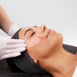 Women getting face massaged using medik8 products