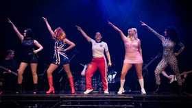 Spice Girls Experience performing on stage