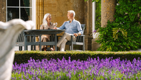 Couple enjoying each others company drinking gin