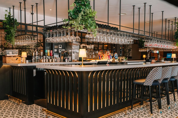 Elegant spaces, expertly poured drinks and the perfect setting to unwind together.