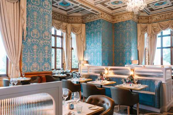 Every detail in The Blue Room is crafted for comfort and style, from the elegant table settings to the carefully chosen chairs.