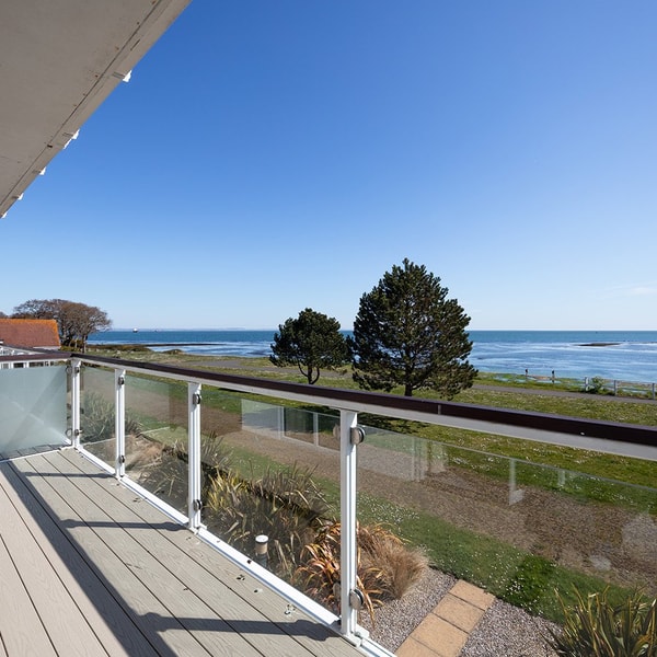 Relax on the room balcony, soak in the sun and listen to the waves.