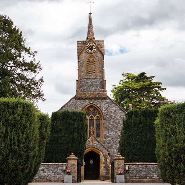 View of the Church on Cricket St. Thomas grounds featuring lush greenery ideal for country strolls