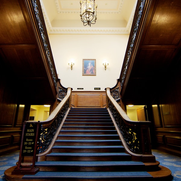 This grand Victorian staircase can be found in the manor house.