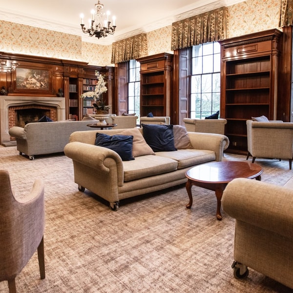 The Library at Nidd Hall with comfortable seating in a warm environment with good lighting.