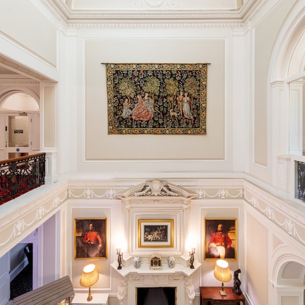Nidd Halls grand reception area with beautiful artwork and ample lighting.