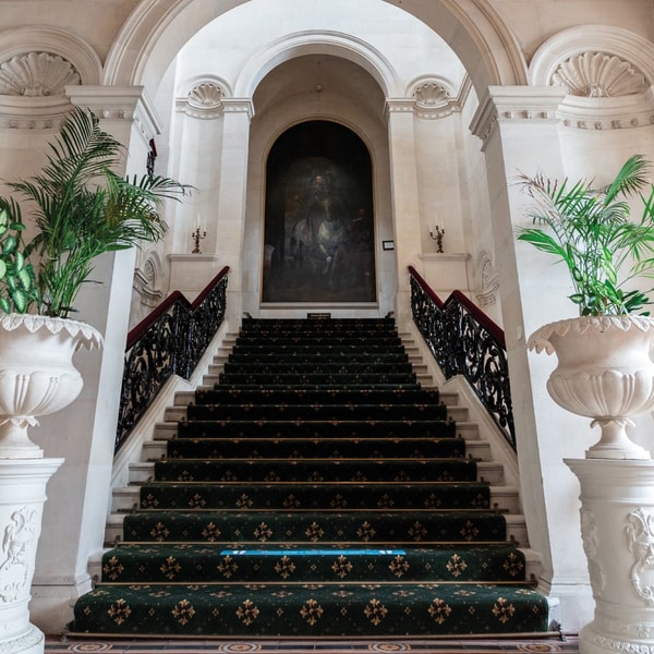 Historic features, such as this grand stairwell in the Great Hall, can be found throughout the manor.