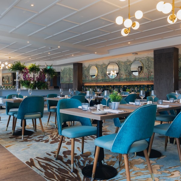 Brasserie32: The restaurant decor is modern and bright, creating a warm and welcoming atmosphere, enhanced by natural light from large windows that overlook Bell Weir Lock.