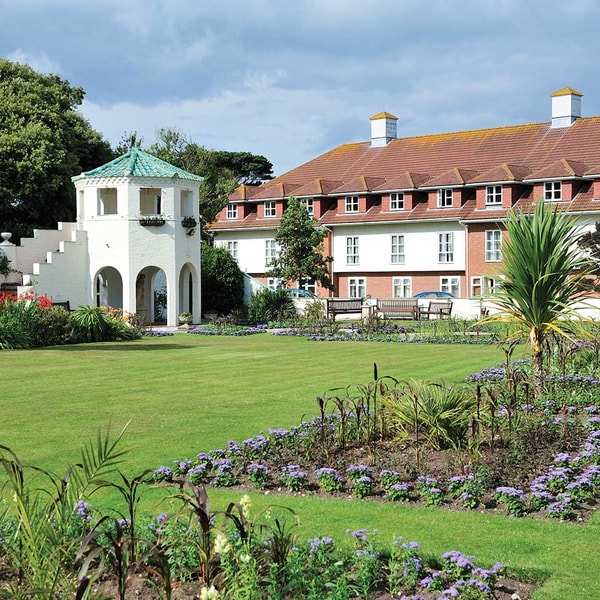 Surround yourself with the vibrant blooms of the walled garden. Every moment spent here brings joy.