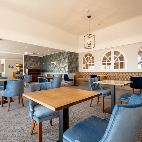 Feel right at home in the Four Tides restaurant. With inviting tables and cheerful ambience, it's the perfect place to sit down for your evening meal.