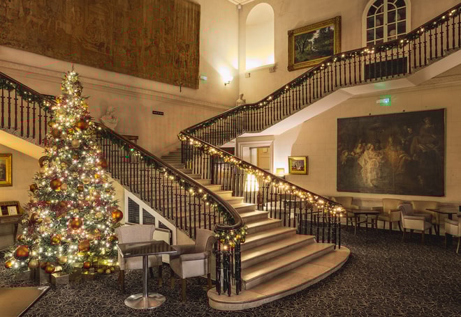 Christmas tree in the grand entrance hall at Cricket St. Thomas