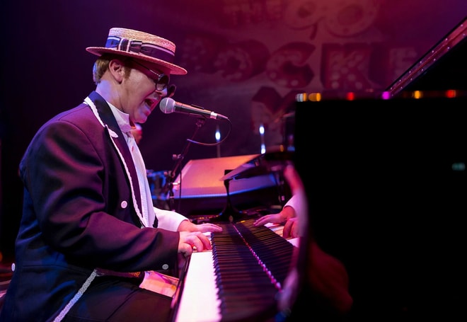 Jimmy Love as Elton John