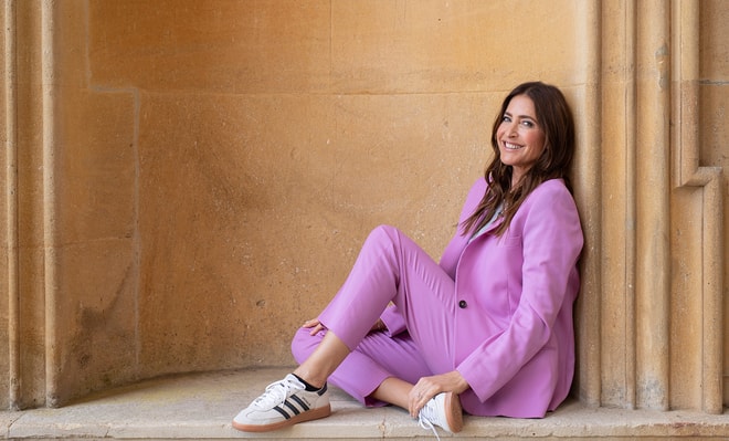 Lisa Snowdon relaxing outside a building