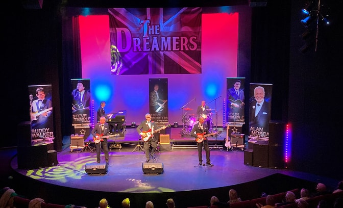 The Dreamers performing on stage