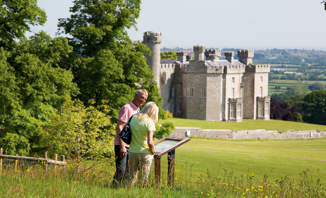 Two guests exploring the grounds at Bodelwyddan Castle