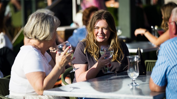 Guests enjoying a drink on the Arden Terrace at Studley Castle.