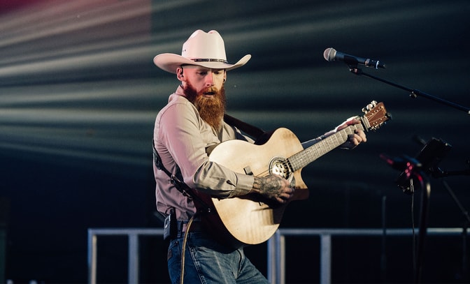 Adam Harding playing guitar