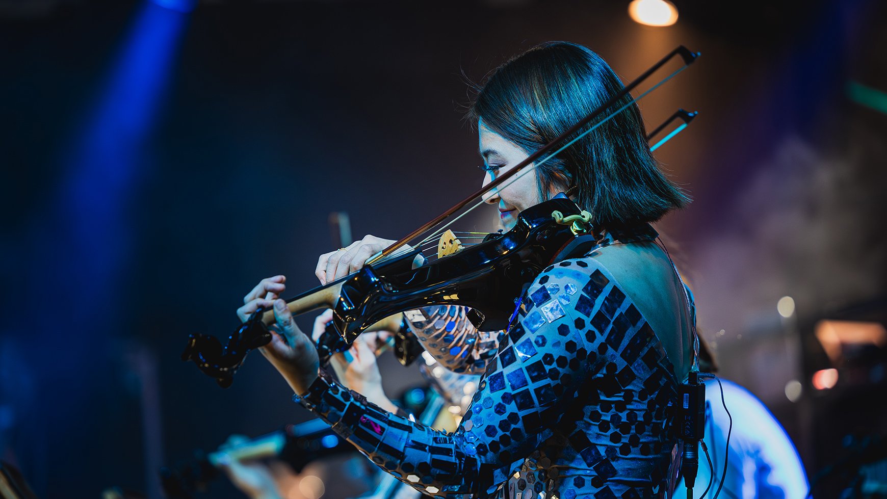 Close up of a violinist from behind